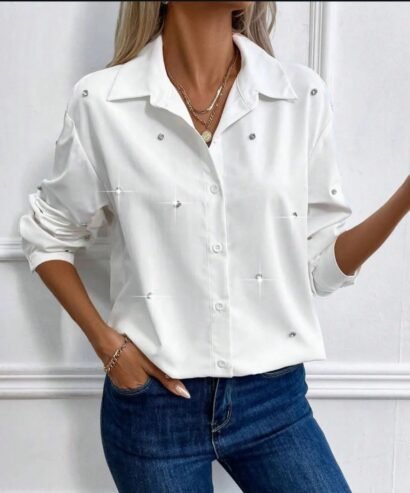 Blusa blanca con perlas